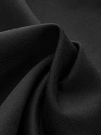 Asymmetrical layer wide-leg dress pants with button details, featuring soft fabric and a contemporary silhouette for modern…