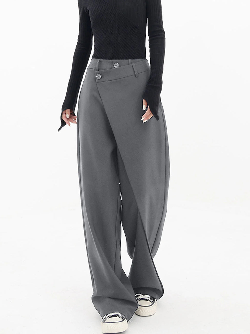 Asymmetrical layer wide-leg buttoned dress pants in soft fabric, featuring a trendy design and elegant button details.