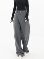 Asymmetrical layer wide-leg buttoned dress pants in soft fabric, featuring a trendy design and elegant button details.