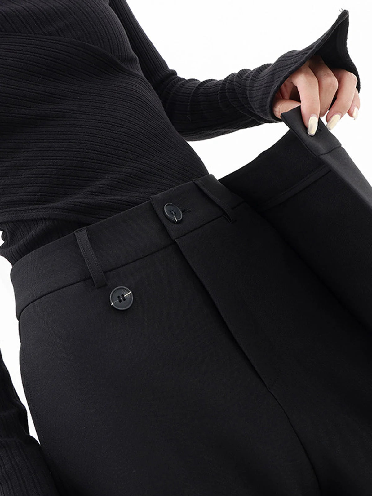 Asymmetrical layer wide-leg dress pants with button accents, crafted from lightweight fabric for comfort and style.