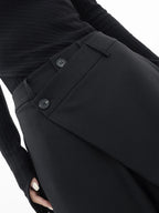 Asymmetrical layer wide-leg dress pants featuring button accents, made from soft, breathable fabric for comfortable wear.