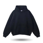 Unisex weighted hoodie in soft fabric with a relaxed fit and a convenient pouch pocket for comfort and warmth.