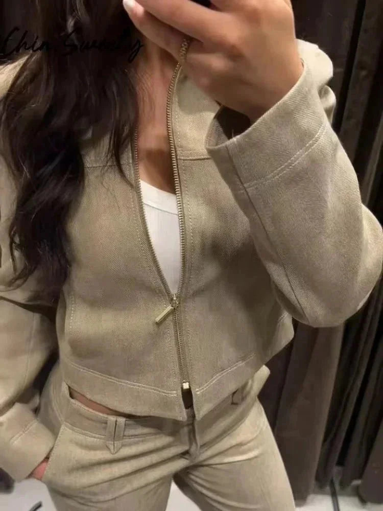 Alt text: Women's 2 piece set featuring a fitted jacket and wide-leg trousers in breathable cotton blend, perfect for casual…