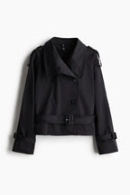 Women's beige short trench coat with belt, made from durable cotton blend, featuring a classic design and tailored fit.