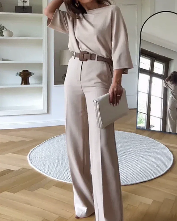 Women's beige two-piece set featuring a belt and matching pants, made from soft, breathable fabric for all-day comfort.