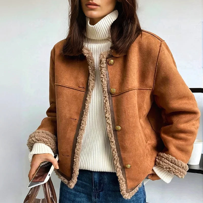 Women's brown fleece coat featuring a button front and soft, warm fabric, perfect for casual and chilly days.