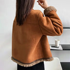 Women's brown fleece coat featuring a button front and soft, warm material, perfect for chilly weather.