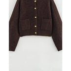 Women's brown knit cardigan featuring long sleeves and pockets, crafted from soft, cozy fabric for warmth and style.