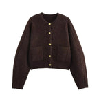 Women's brown knit cardigan featuring long sleeves and two front pockets, perfect for layering in cool weather.