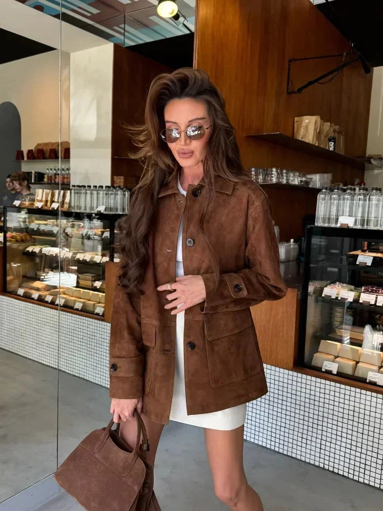 Women's brown suede-look short jacket with a collared design, featuring a soft texture and versatile style for casual wear.