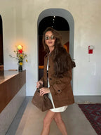 Brown suede-look short jacket for women with a collared design and a casual, stylish fit perfect for layering.