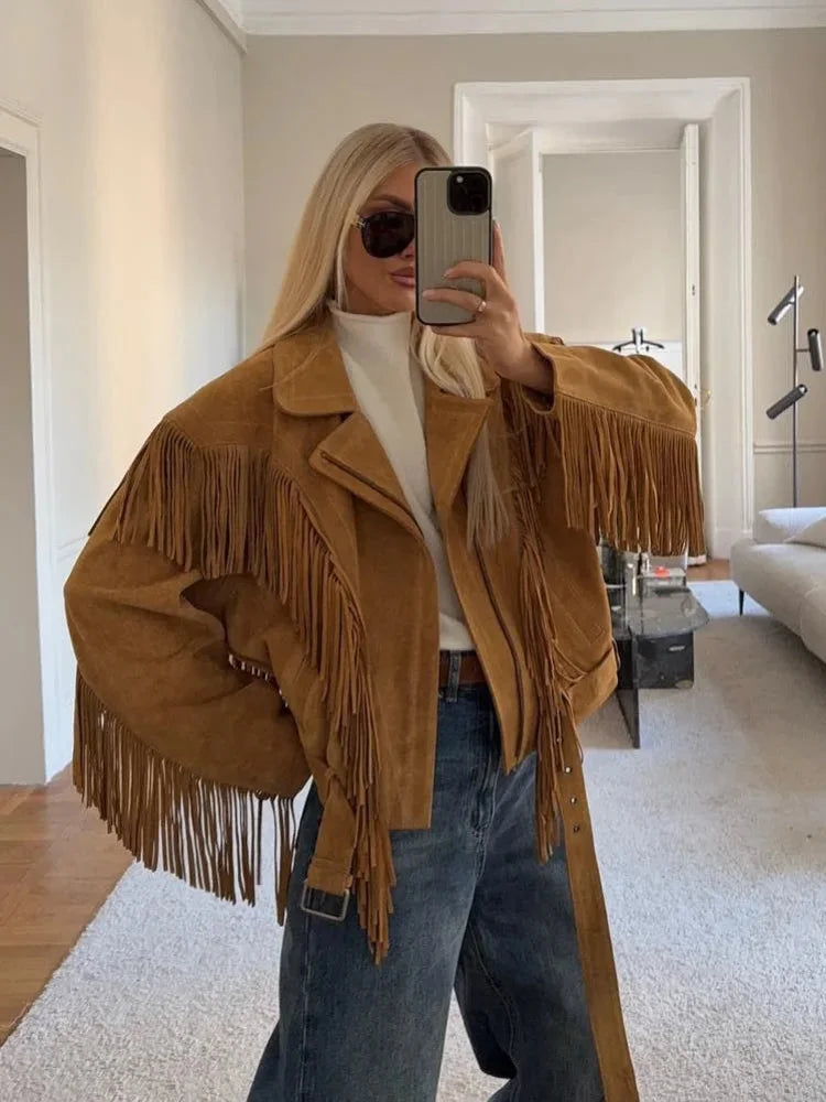 Women's brown long sleeve tassel jacket made of soft fabric, featuring a stylish fringe design, perfect for fall layering.