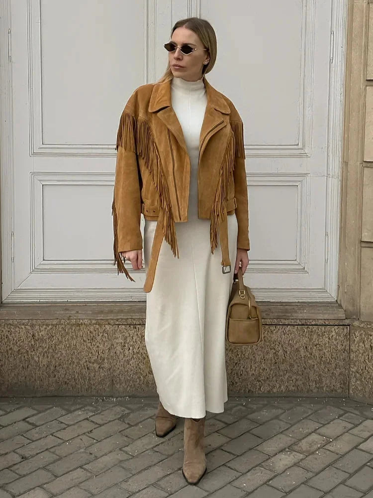 Women's brown long sleeve tassel jacket made of soft fabric, featuring stylish tassel accents and a relaxed fit for fall…