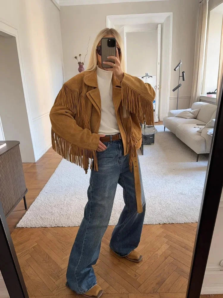Women's long sleeve brown tassel jacket made of soft fabric, featuring a stylish fringe design, perfect for fall outings.