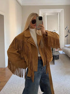 Women's brown long sleeve jacket with tassel details, crafted from soft fabric, perfect for fall outerwear styling.