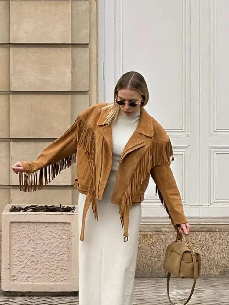 Women's brown long sleeve tassel jacket featuring soft fabric, a relaxed fit, and stylish fringe accents for fall outerwear.