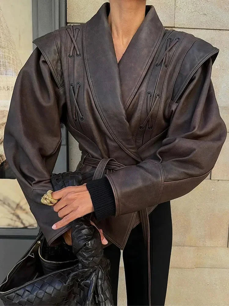 Women's brown tie-waist jacket in structured design with a comfortable fabric and tailored silhouette for a polished look.