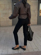 Women's brown tie-waist jacket featuring a structured design, made from soft fabric for a stylish and comfortable fit.
