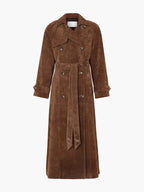 Women's brown trench coat made of durable fabric, featuring a belted waist and classic lapels for a tailored look.