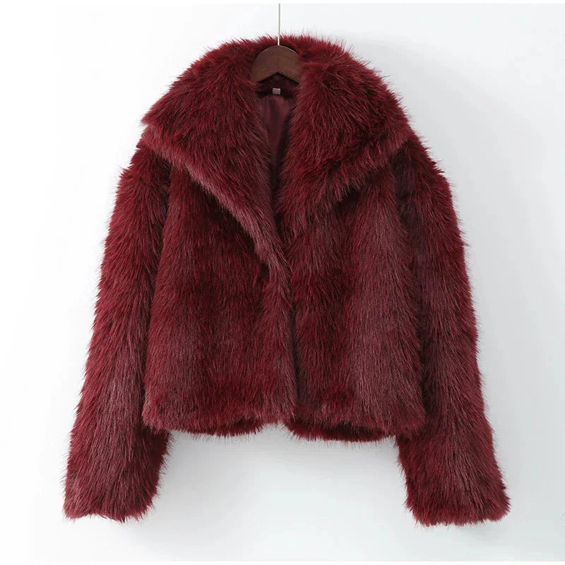 Women's burgundy faux fur coat featuring an oversized collar and soft texture, perfect for chilly weather outfits.