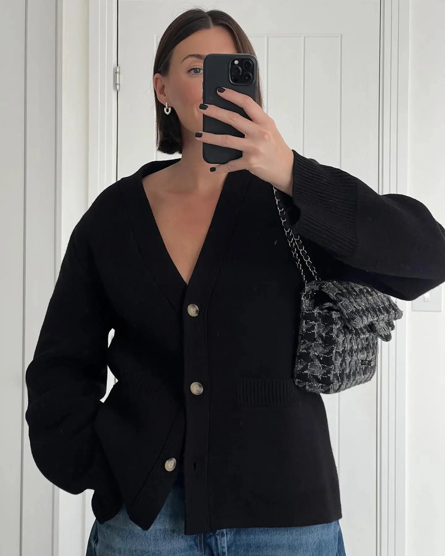 Lightweight women's button-front cardigan with wide sleeves, crafted from soft cotton blend for comfort and ease of movement.