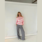 Women's casual striped sweater made of soft cotton, featuring a relaxed fit and long sleeves for everyday comfort.