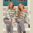Women's casual striped sweater made from soft cotton blend, featuring a relaxed fit and long sleeves for everyday comfort.