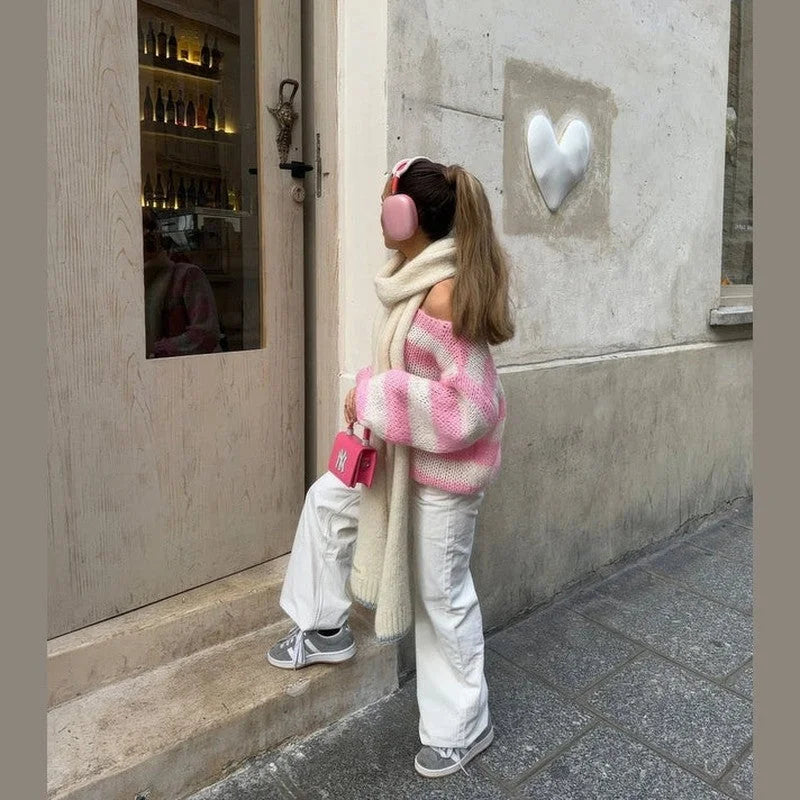 Women's casual striped sweater made of soft cotton blend, featuring a relaxed fit and vibrant horizontal stripes for…