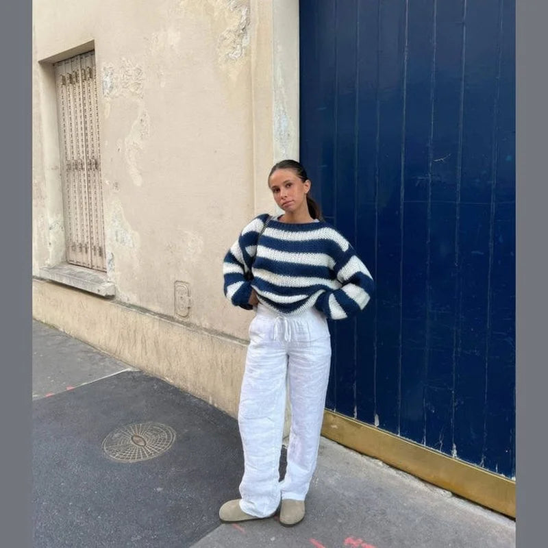 Women's casual striped sweater made from soft cotton blend, featuring a relaxed fit and comfortable long sleeves for…