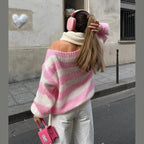Cozy women's striped sweater made from soft cotton, featuring a relaxed fit and long sleeves for casual everyday wear.