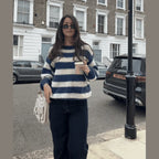 Cozy women's casual striped sweater made of soft cotton for everyday comfort, featuring a relaxed fit and long sleeves.