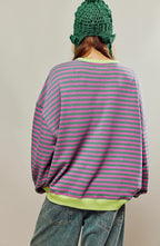 Women's casual striped sweater featuring a relaxed fit, made from soft cotton blend for comfort and breathability.