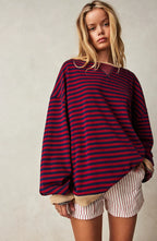 Women's casual striped sweater in soft cotton blend, featuring a relaxed fit and a classic crew neck design.
