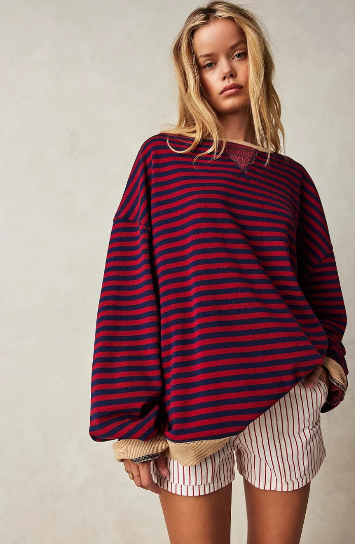 Women's casual striped sweater in soft cotton blend, featuring a relaxed fit and a classic crew neck design.