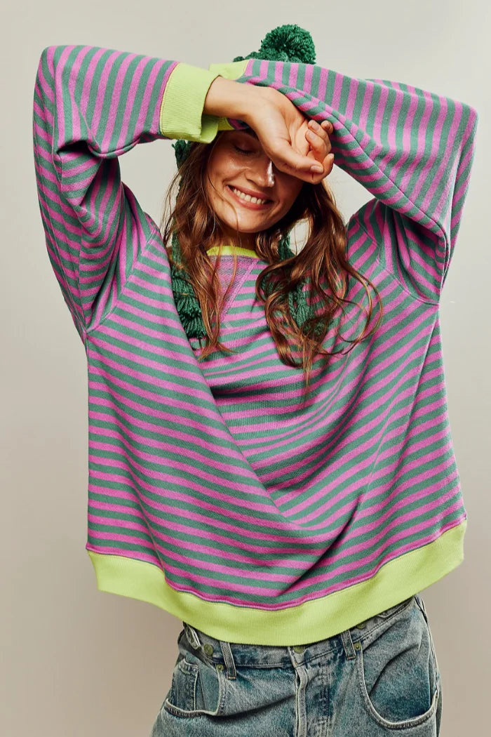 Women's relaxed fit casual sweater with vertical stripes, crafted from soft cotton blend for comfort and breathability.