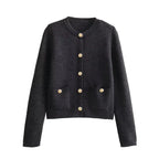 Women's chic knitted button-up cardigan in soft yarn, featuring a classic design with textured buttons and a cozy fit.