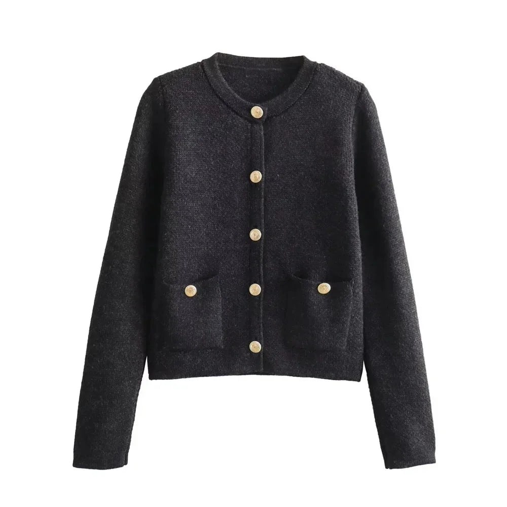 Women's chic knitted button-up cardigan in soft yarn, featuring a classic design with textured buttons and a cozy fit.