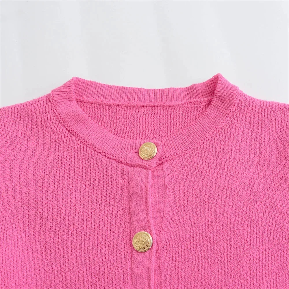 Women's knitted button-up cardigan, featuring a cozy fabric with a classic design and textured buttons for added style.