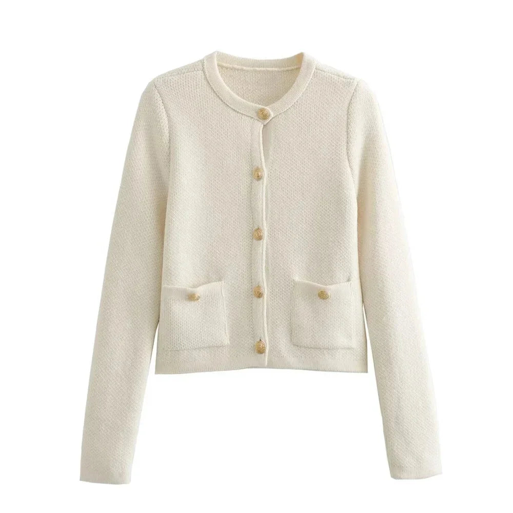 Women's chic knitted button-up cardigan made from soft fabric, featuring a cozy design and classic buttons for versatile…