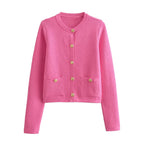 Women's chic knitted button-up cardigan in soft yarn, featuring a classic silhouette and delicate button detailing.