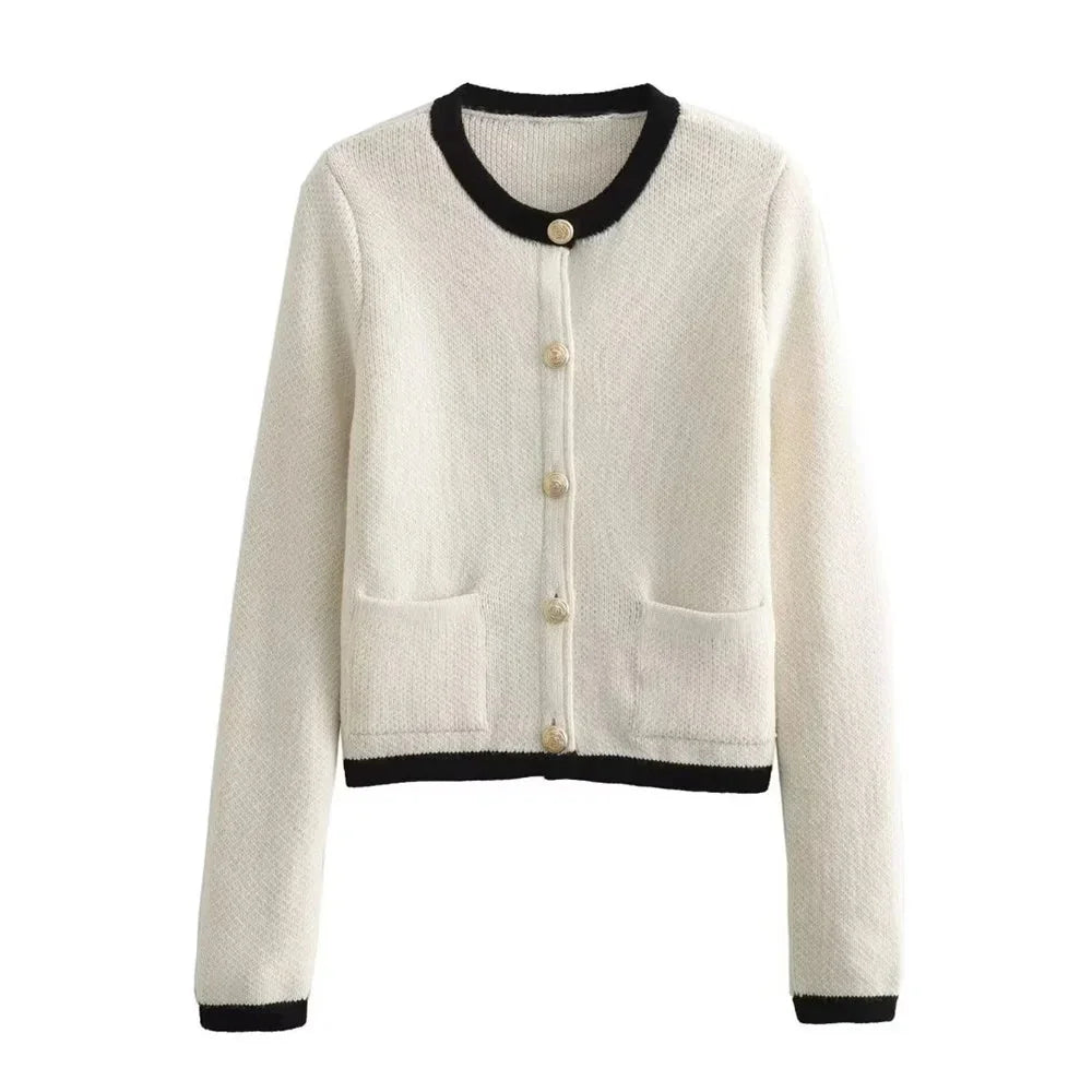 Women's chic knitted button-up cardigan in soft cotton blend, featuring a relaxed fit and elegant button detailing.