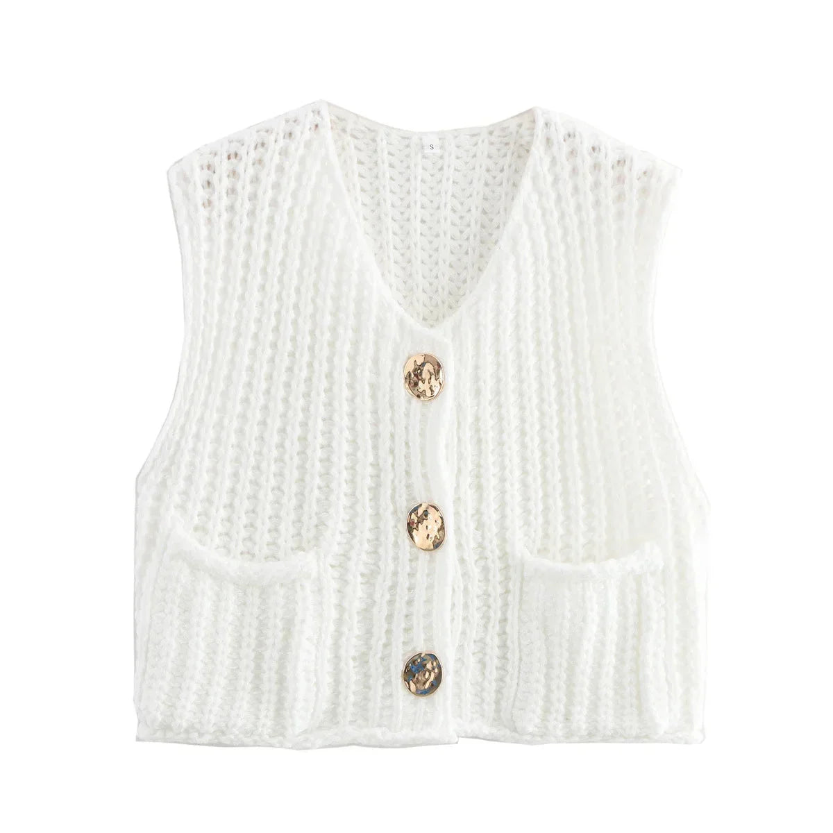 Women's chunky knit vest with pockets, made of soft, warm yarn featuring a relaxed fit and textured knit pattern.