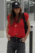 Women's chunky knit vest featuring front pockets, crafted from soft, cozy yarn, perfect for layering in cool weather.