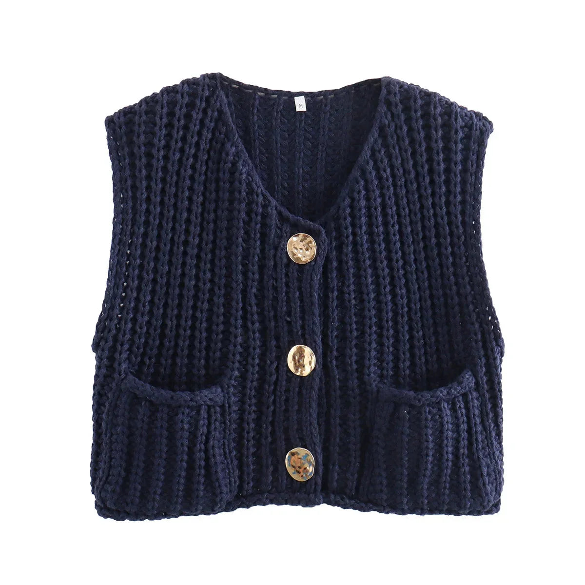 Women's chunky knit vest with pockets, made of soft acrylic yarn, featuring a relaxed fit and ribbed edges for a cozy look.
