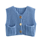 Women's chunky knit vest with pockets, featuring a cozy textured design and comfortable fit for layering in cool weather.