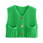 Cozy women's chunky knit vest with pockets, featuring a relaxed fit and thick yarn for warmth and comfort.