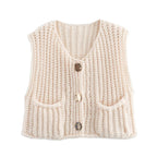 Women's chunky knit vest featuring spacious pockets, made from soft yarn for warmth and comfort in a cozy, relaxed fit.