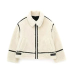 Women's cream zip-up teddy jacket features soft fabric, convenient pockets, and a cozy design for casual wear and warmth.
