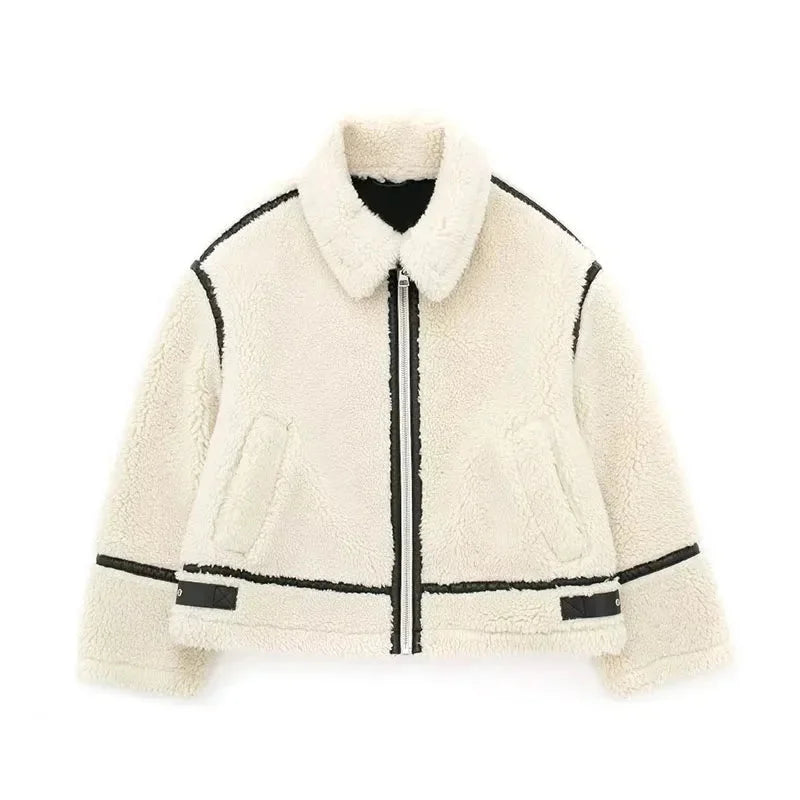 Women's cream zip-up teddy jacket features soft fabric, convenient pockets, and a cozy design for casual wear and warmth.