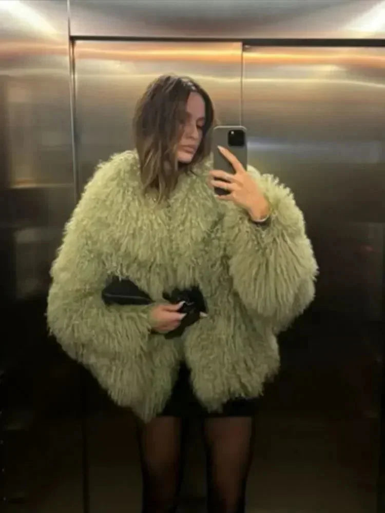 Women's cozy fluffy faux fur jacket in soft brown, featuring a relaxed fit and side pockets for warmth and comfort.